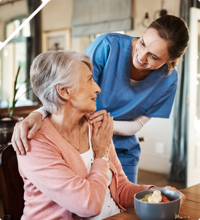 senior patient talking with the staff