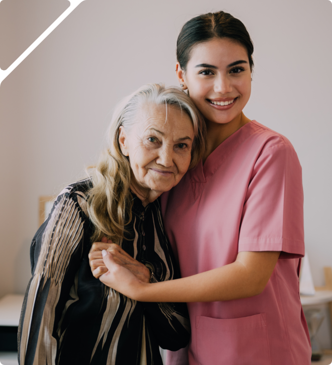 senior patient and the caregiver smiling