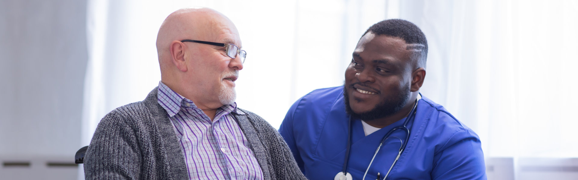 Caregiver and the patient smiling